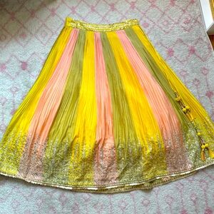 Yellow, pink, green Lehenga with silver accents